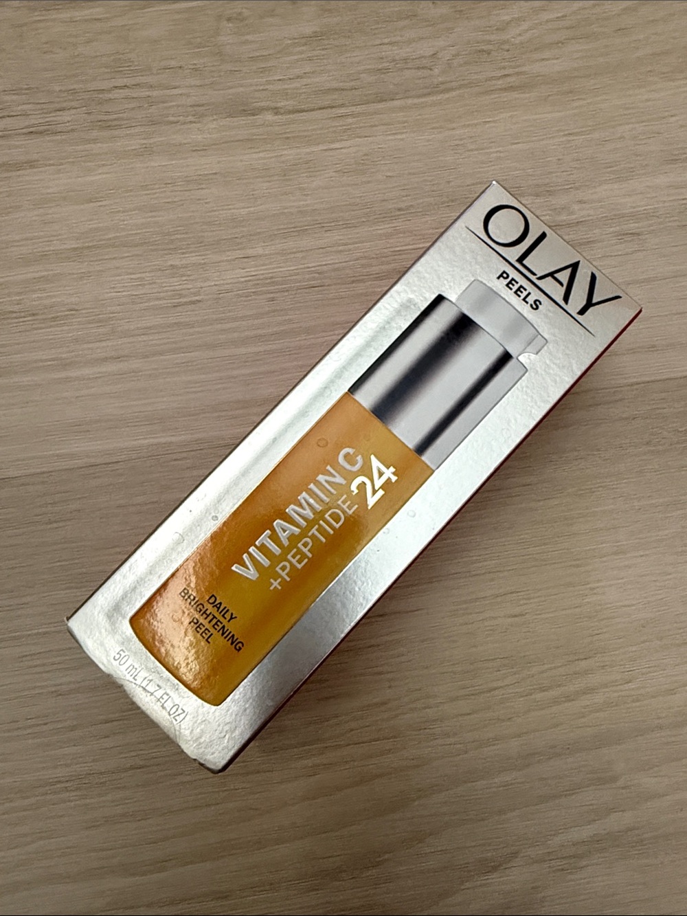 OLAY Vitamin C + Peptide 24 Daily Brightening Peel - Yellow and Silver